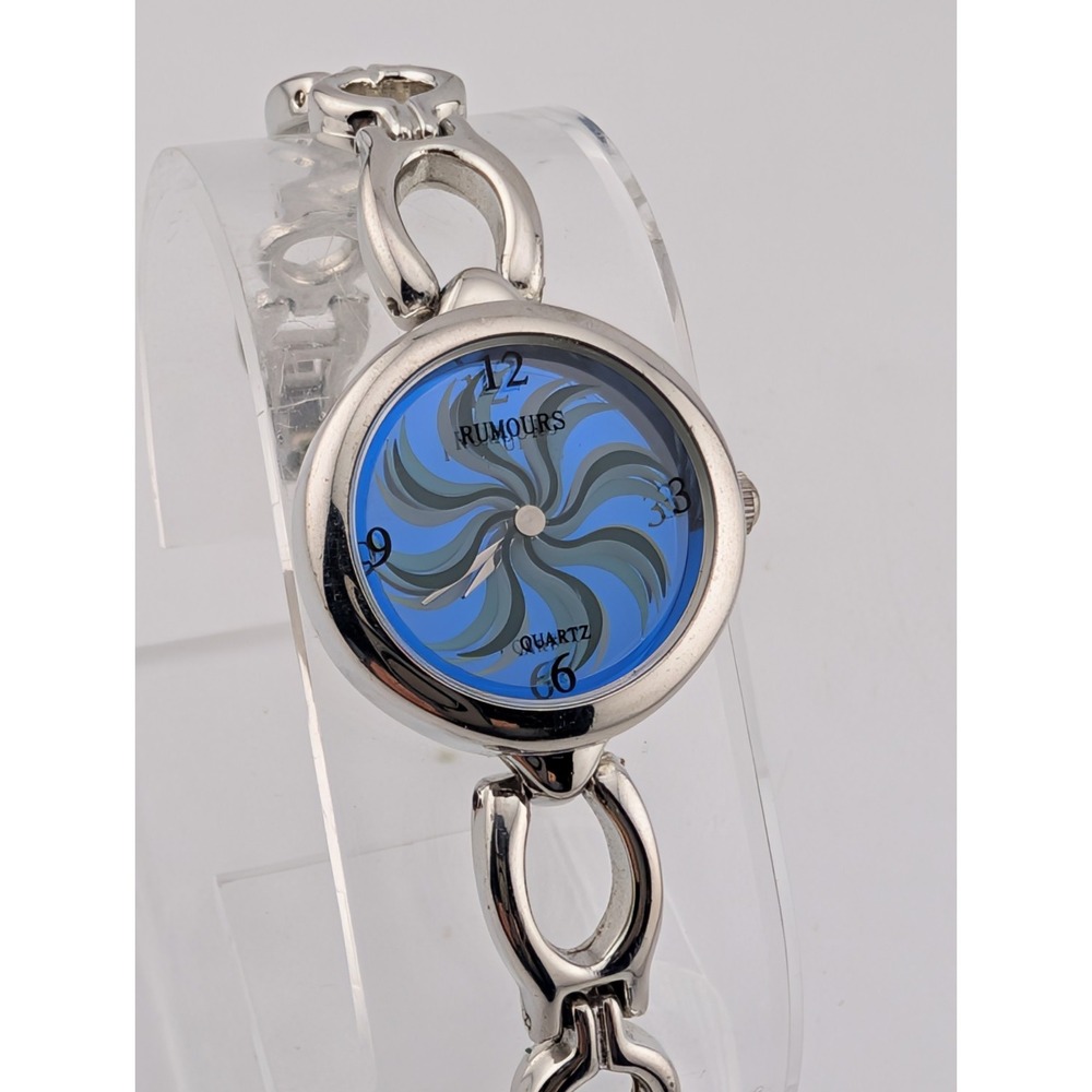 Rumours Watch Women Blue Rotating Dial Silver 5.75" Band- New Battery